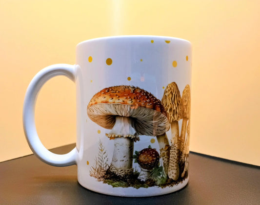 White ceramic mug with detailed mushroom illustrations and golden polka dots on a beige background