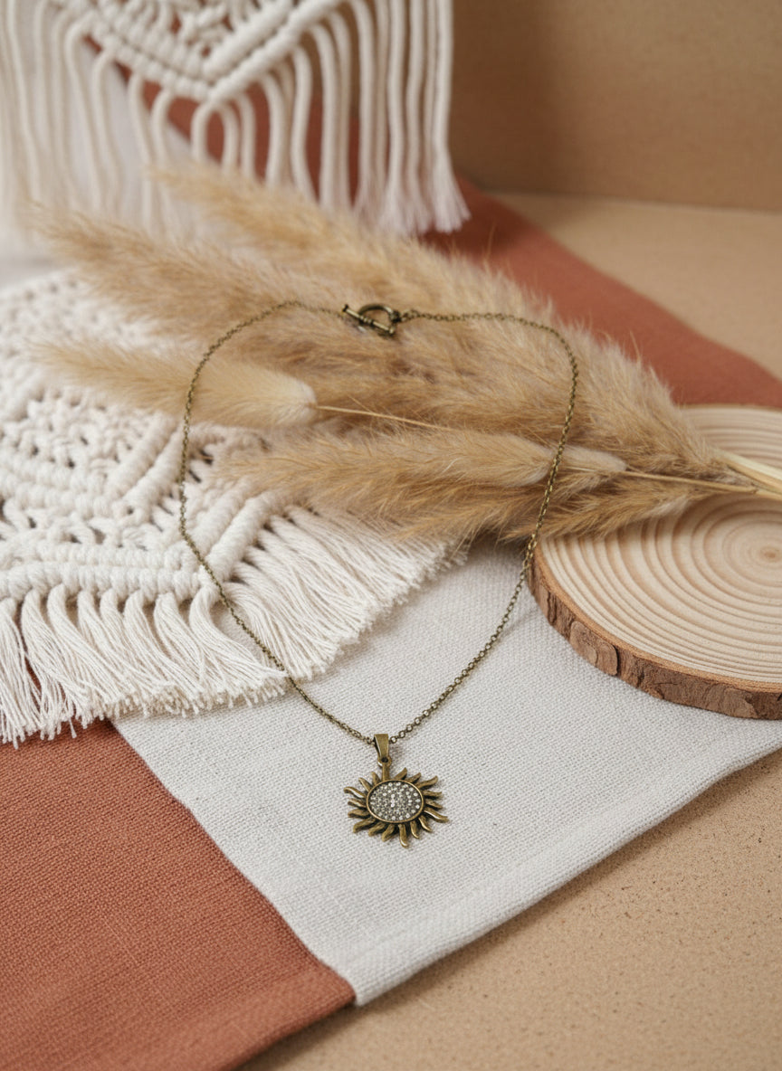 Sun pensand on a broze chain