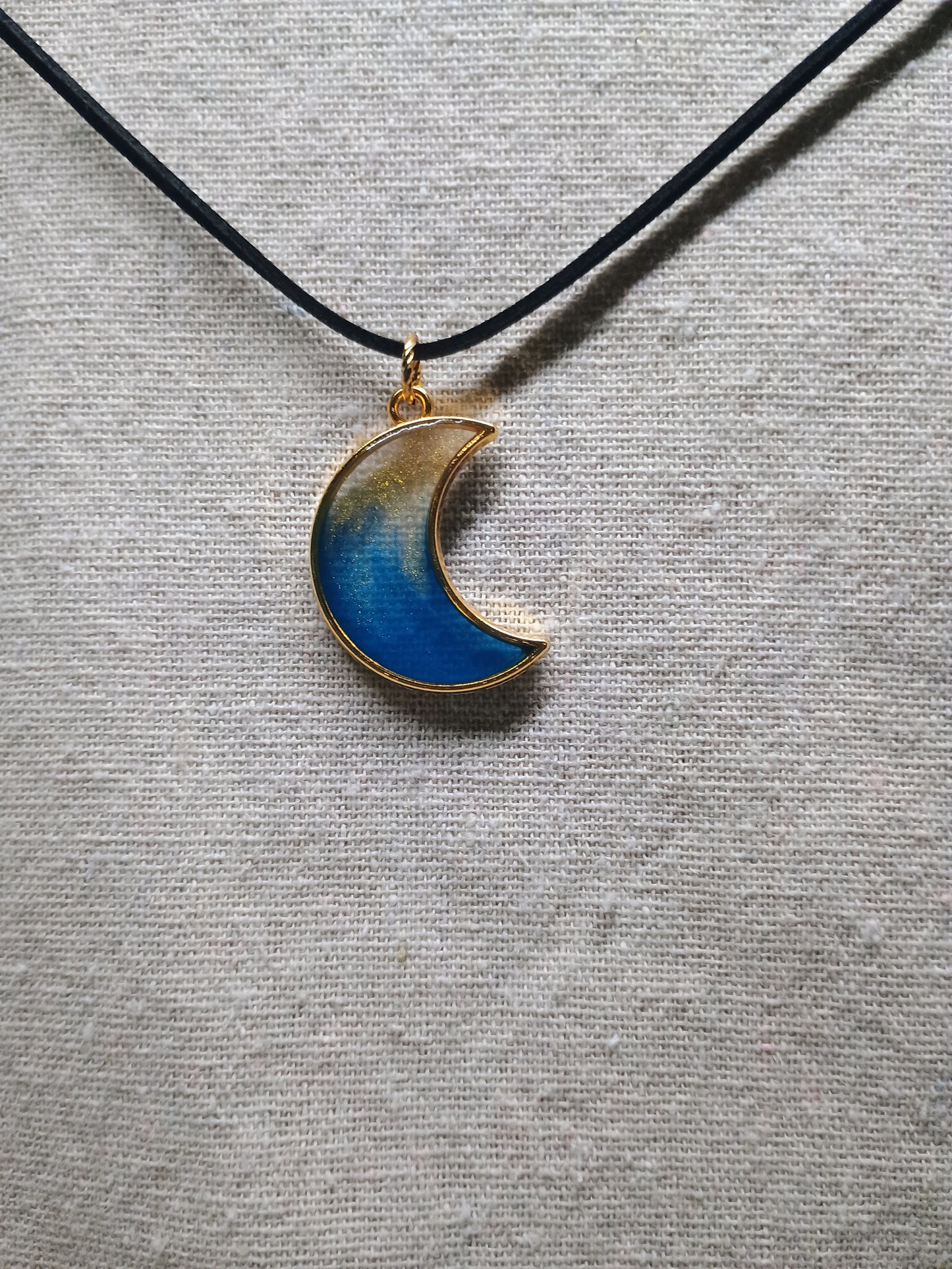 Midnight Aura – Half Moon Resin Pendant in Blue & Gold