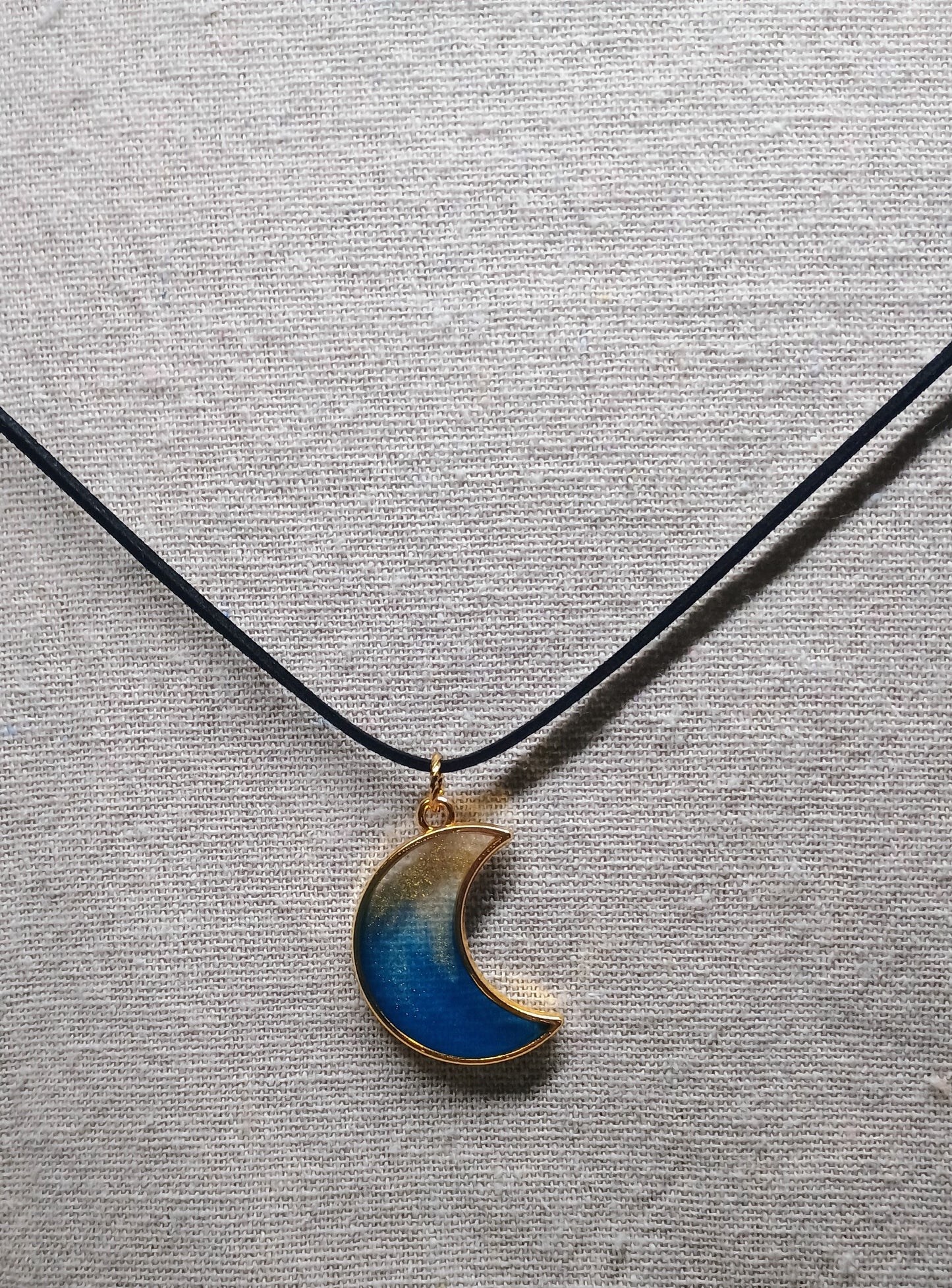Midnight Aura – Half Moon Resin Pendant in Blue & Gold