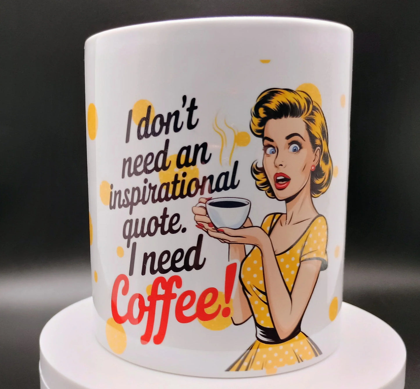 White coffee mug with retro woman holding a cup and text saying I don't need an inspirational quote, I need Coffee