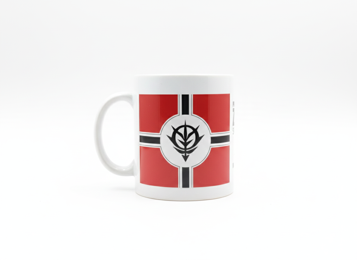 White ceramic mug with red and black emblem resembling a stylized leaf in a circular design